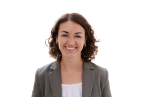 Picture of a woman with brown hair in a blazer and white shirt